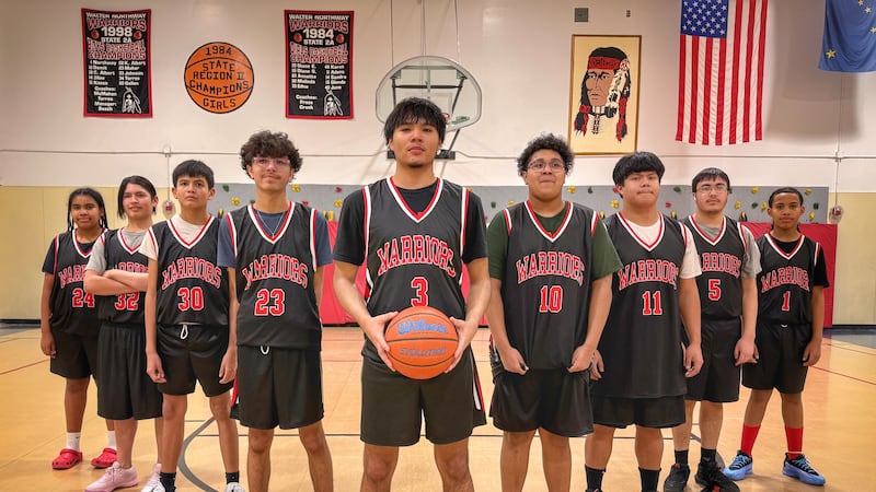 Northway's Terrence Titus (Center) broke the Alaska High School Basketball single-game scoring...