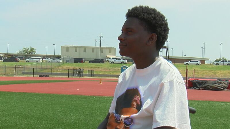 Devot takes the stage at Eisenhower's Graduation just 7 months after his devastating car wreck.