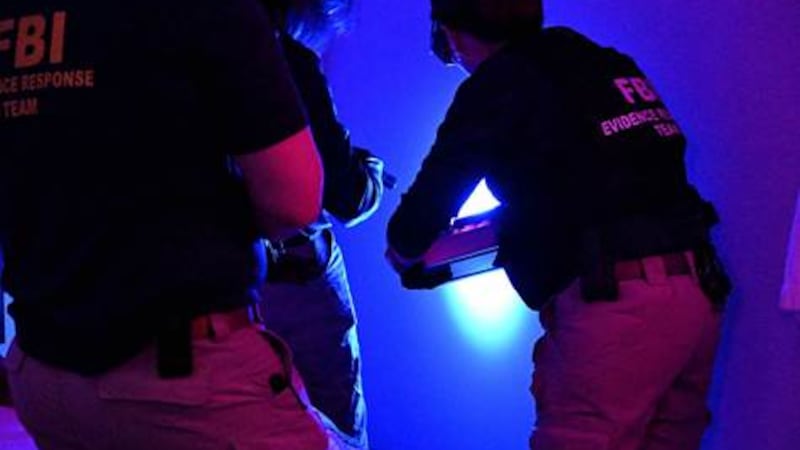 The FBI Evidence Response Team collecting evidence