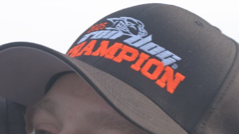 Brad George (Team 20) dons a "2025 Iron Dog Champion" in the winners shoot after finishing...