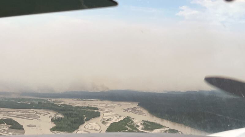 Rain that fell in Interior Alaska Monday night has helped dampen and stem the spread of the...