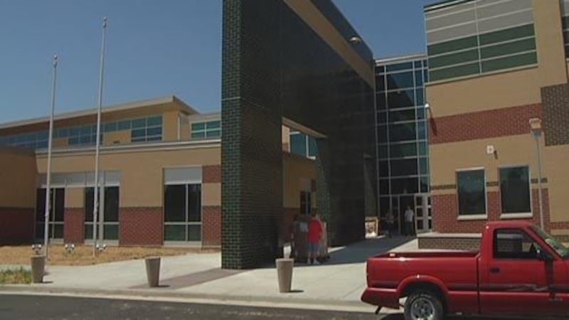 A high school teacher and track coach is accused of sexually assaulting a student “nearly...