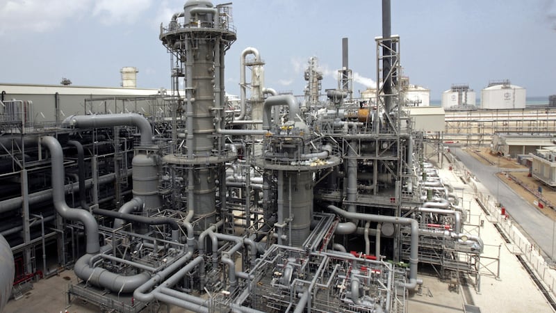 FILE- In this April 4, 2009 file photo, a gas production facility is seen at Ras Laffan,...