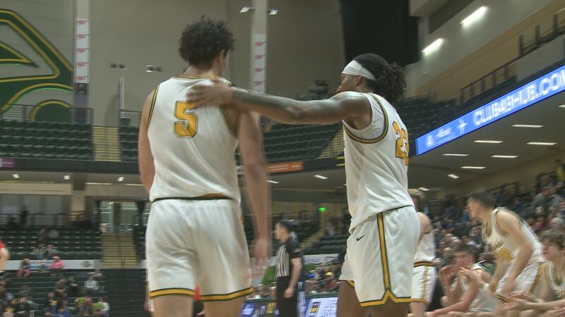 Barlett's Bishop Tosi (left) and East Anchorage's Hasaan Herrington (right) have teamed up and...