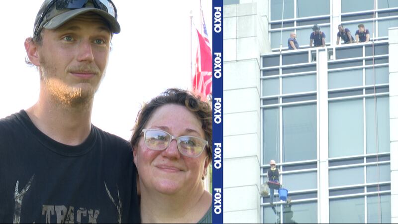 A worker who was left dangling 450 from a skyscraper said he is grateful for the crews who...