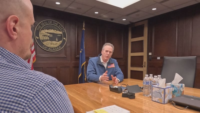 Governor Mike Dunleavy and John Thompson