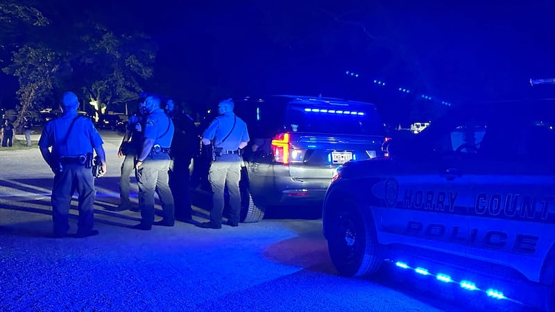 In this photo provided by the Horry County Police Department, police officers respond to the...