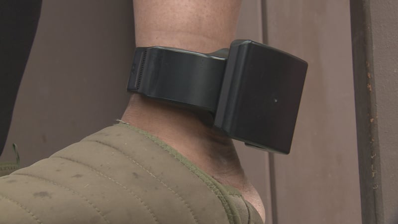 Dept. of Corrections Pretrial Enforcement officers doing regularly scheduled check-ins with...