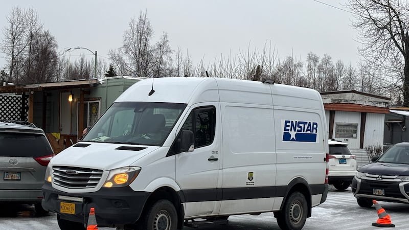 Enstar gas attending to a reported gas leak.