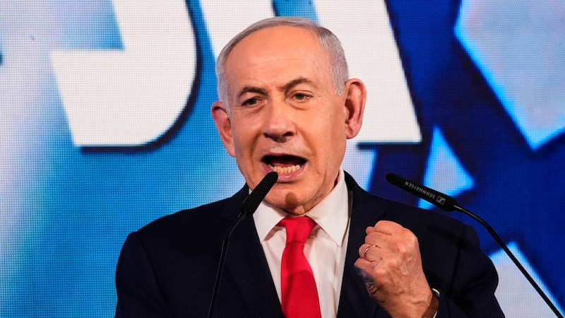 Israeli Prime Minister Benjamin Netanyahu speaks to his supporters at Likud party headquarters...