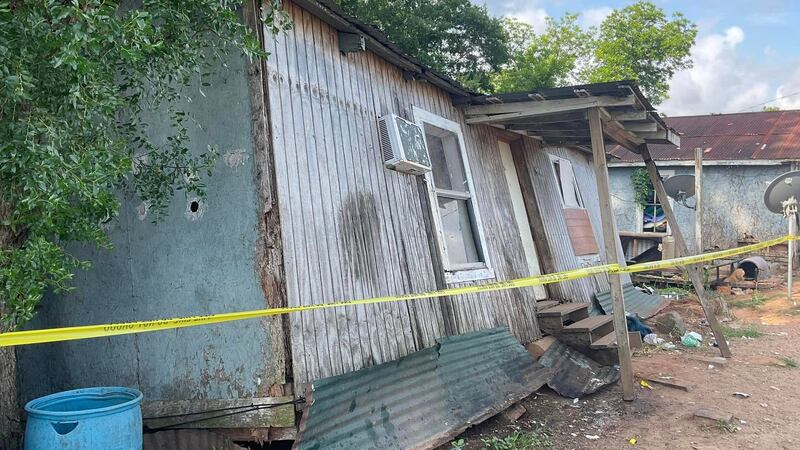 Ten adults and eight children were rescued from a home after the foundation collapsed on...