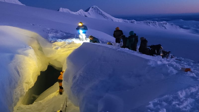 A snowmachine rider is alive after falling nearly 60 feet deep into a glacial crevasse,...