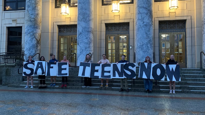 The group of high school students is talking with their peers about healthy relationships.