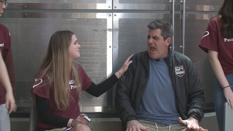 South High teacher gets zapped by period cramp simulator for fundraiser