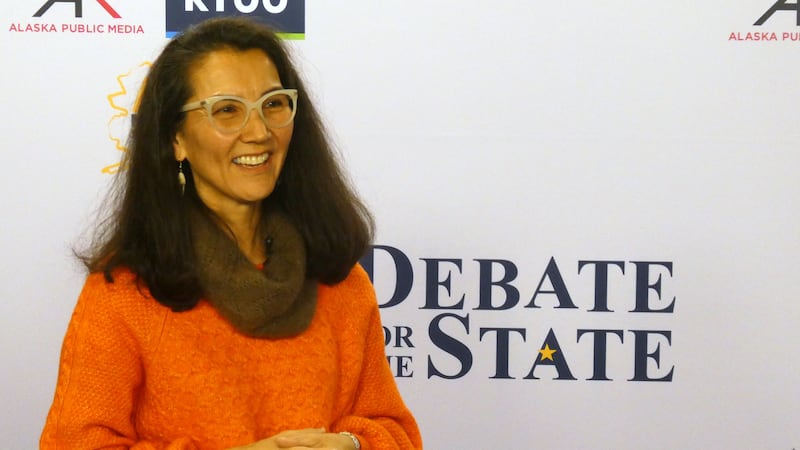 In this photo shot with a smart phone, Democrat Mary Peltola smiles ahead of a debate with...