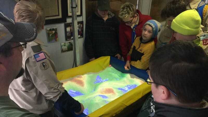 Boy scouts learn about soil and water conservation.