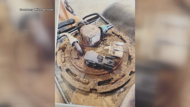 A photo of a rusted gas cap.