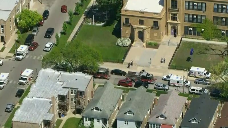 Multiple police officers, firefighters and EMTs responded to Fort Dearborn Elementary School.