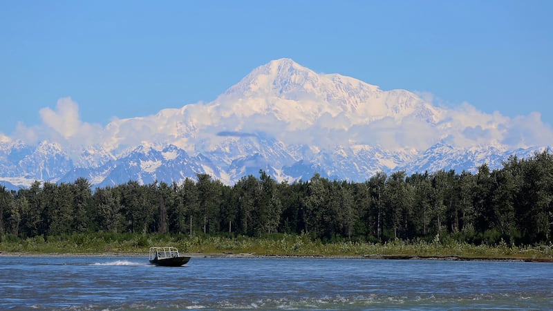 FILE - A boat is seen on the Susitna River near Talkeetna, Alaska, on Sunday, June 13, 2021,...