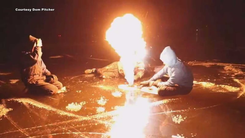 Torching Ice Rink Using ice axes and blow torches to ignite Alaskan lakes