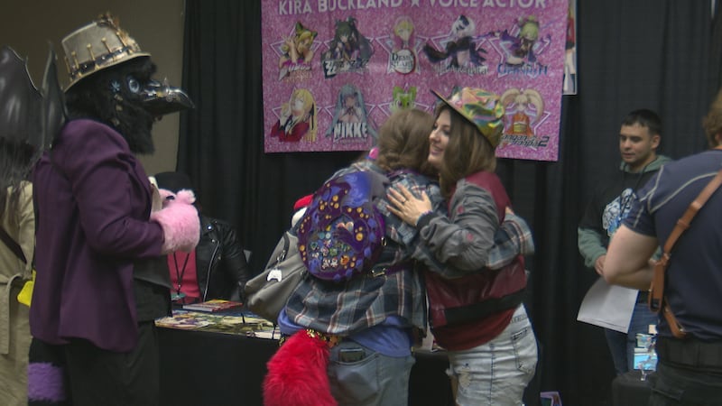 Kira Buckland (right) hugs fan at Arctic Comic-Con 2025