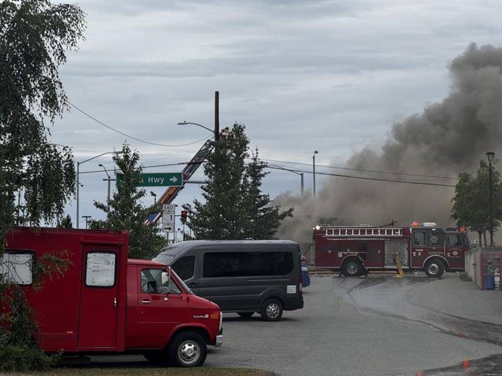 Large plumes of black smoke were seen over downtown Anchorage Thursday afternoon as a fire...