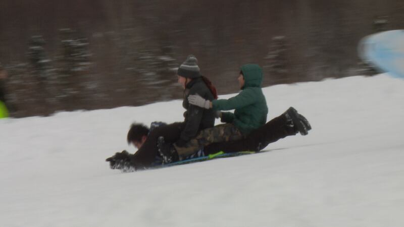 Sledders and skiers got out to enjoy the early season snow at Kincaid Park.