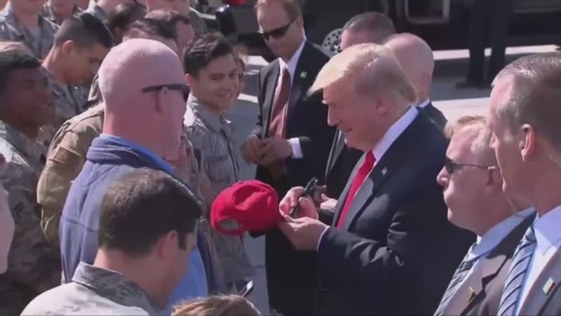 President Trump greets Alaska servicemembers during a brief stop at Elmendorf Air Force Base.