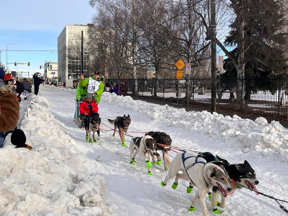 Former champion Ryan Redington leads his team out on the ceremonial start to Iditarod 53 on...