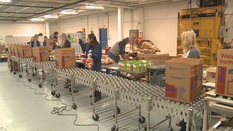 Volunteers prepare the Thanksgiving Blessing boxes