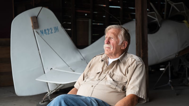 In this Aug. 2025 photo provided by James Wilson, Ken Jouppi sits in a hanger at the Shoshone...