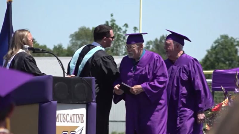 Two Navy veterans in Iowa got the chance to walk across the graduation stage more than 60...