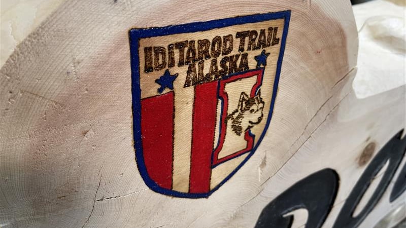 The new Iditarod Burled Arch and the logo.