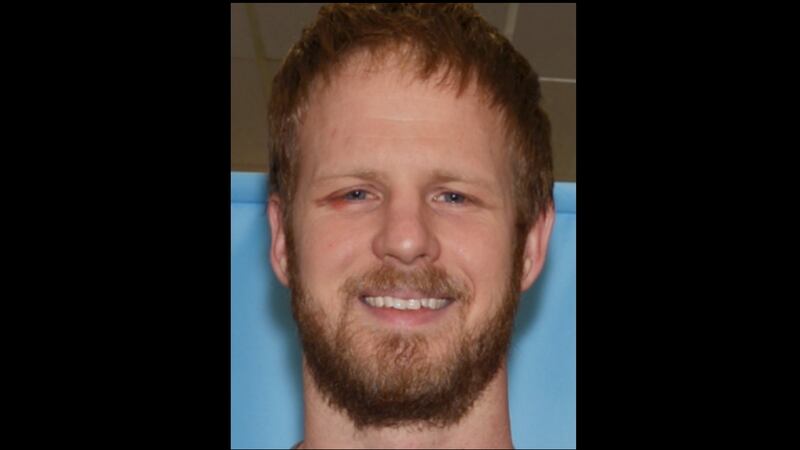 Profile of Justin Schneider, 33. (Photo from the Anchorage Police Department)