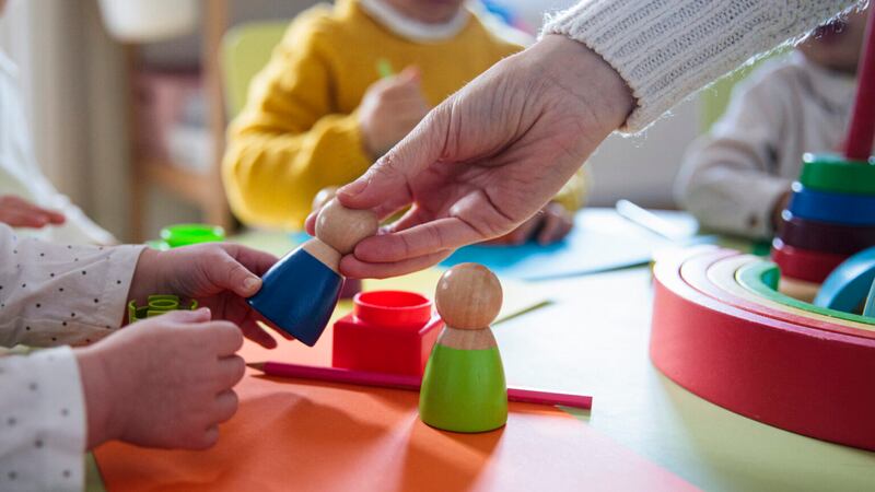 Preschool children playing with colorful shapes (Getty Images)