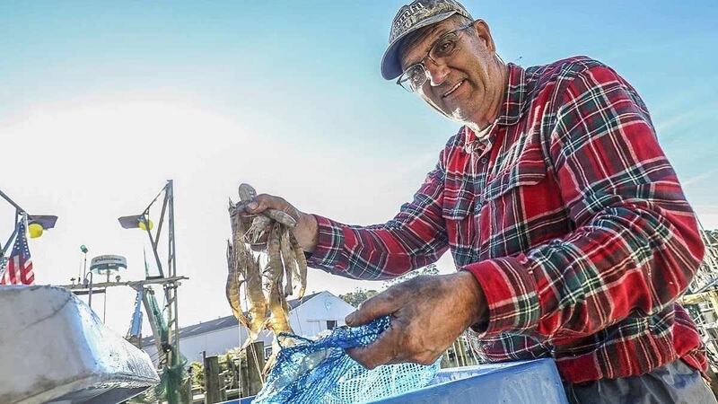 Fisherman Mike Bishop is being remembered as a "hero" after saving his deckhand.