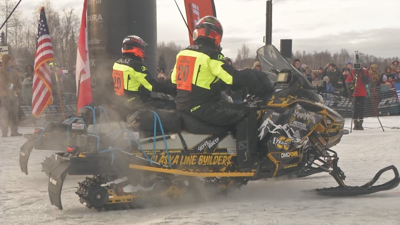 Bradley George and Robby Schachle prepare to leave the starting line in the 2025 Iron Dog Snow...