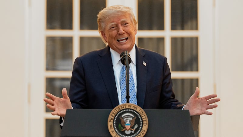 President Donald Trump speaks during a dinner in the Rose Garden of the White House, Thursday,...