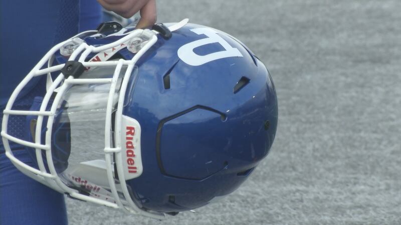 Players stand for the National Anthem ahead of a game between the Palmer Moose and Soldotna Stars