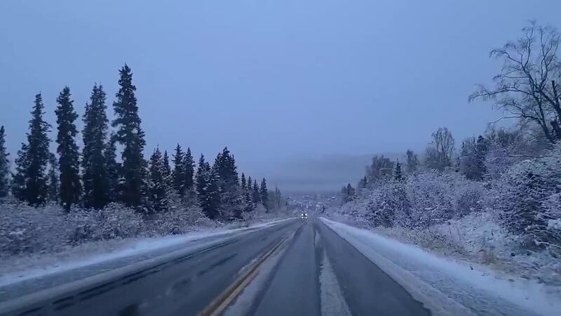 Snowy conditions across Anchorage hillside